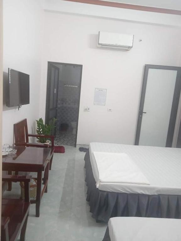 Nha Nghi Dung Tai Acomodação com café da manhã Nghia Lo Quarto foto